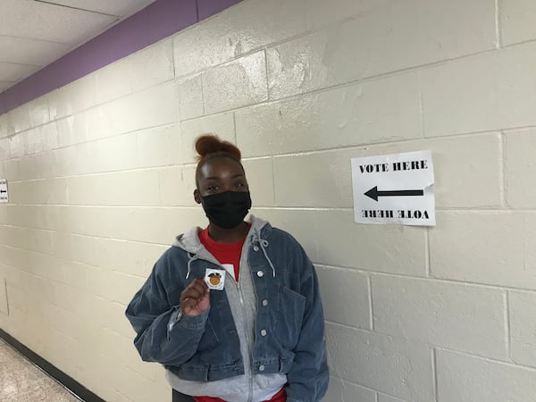 Brittany Brakeford. who voted at Fairington Elementary School in DeKalb County, said it was a "big relief" to see the state's U.S. Senate race end in Tuesday's runoff. “I’m so tired of getting text messages, calls and everything," she said. "I’m here, I made my voice heard and I’m just ready for it to be over.”