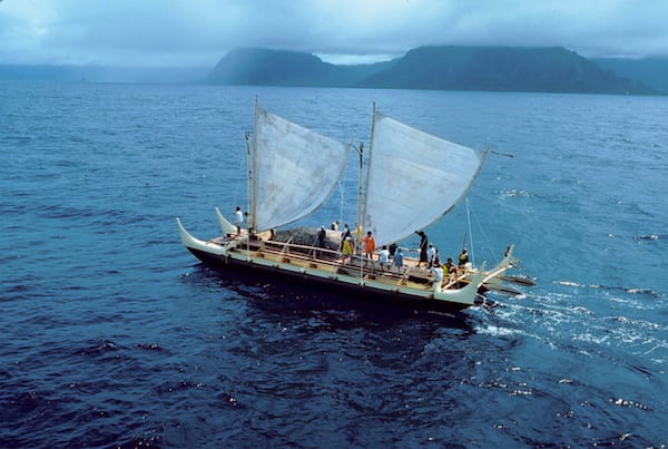 This April 1975 photo shows crew members training on the Hokulea canoe in waters off the windward coast of Oahu, Hawaii. (James Kimo Hugho via AP)