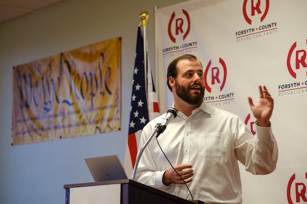 Johnny Moseley, the Georgia director for election integrity for the Republican National Committee, leads a voter integrity training workshop in Cumming. (Arvin Temkar / arvin.temkar@ajc.com)