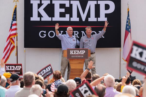 Gov. Brian Kemp campaigns with the support of former Vice President Mike Pence in Cumming on Tuesday, November 1, 2022. (Arvin Temkar/The Atlanta Journal-Constitution)