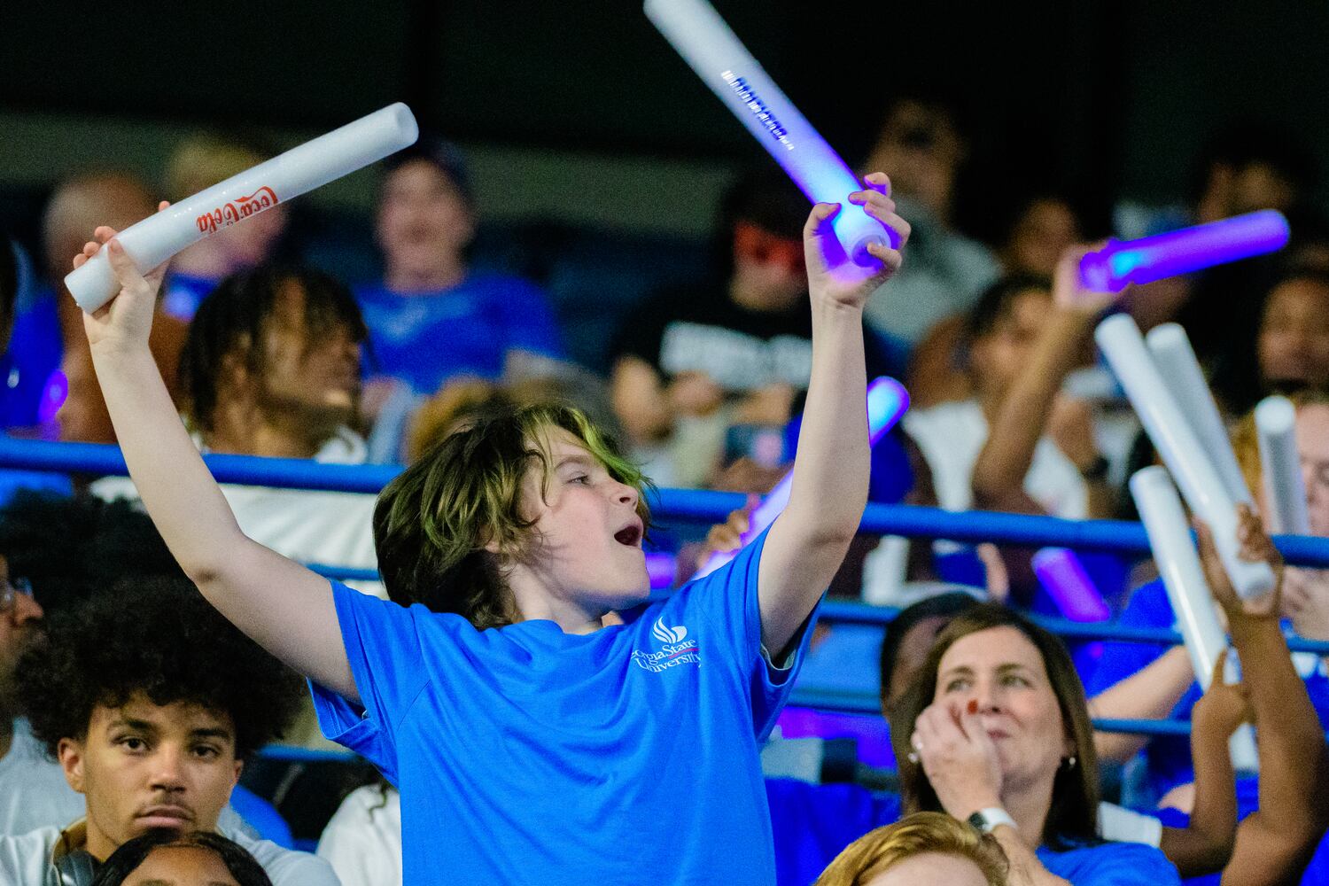 Fans wave glowsticks in the stands during Georgia State's game against Troy  Saturday, Sept. 30, 2023 (Jamie Spaar for the Atlanta Journal Constitution)