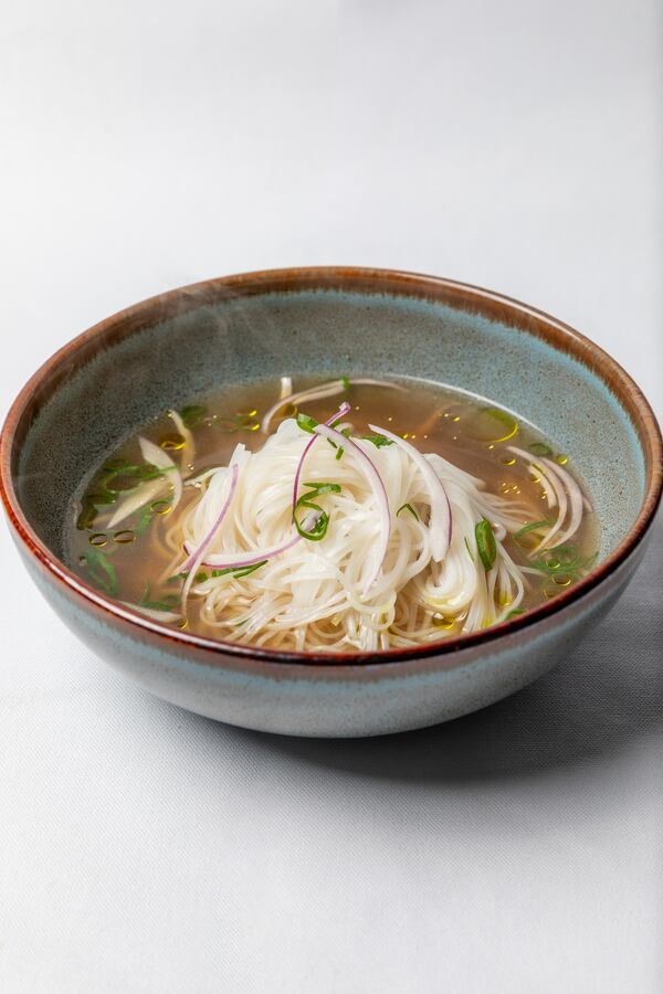 The pho at Juniper Cafe features oxtail broth, sliced beef and rice noodles. The restaurant also offers a vegan version of this Vietnamese soup. Courtesy of Eric Sun