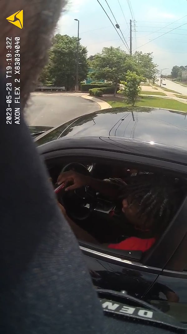 This screen capture from a police body camera video shows the moment that former UGA football player Marcus Rosemy-Jacksaint was pulled over on May 23, 2023 for driving 90 in a 45 mph zone. (Athens-Clarke County Police Department)