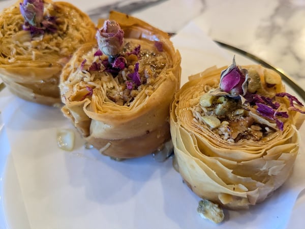 At Rose Valley Sweets, rose baklava is garnished with a rosebud. (Courtesy of Paula Pontes)