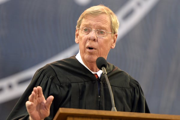 May 9, 2014 Athens - U.S. Senator Johnny Isakson gives the graduation address during the Georgia 2014 Spring undergraduate commencement at Sanford Stadium in Athens on Friday night, May 9, 2014. HYOSUB SHIN / HSHIN@AJC.COM