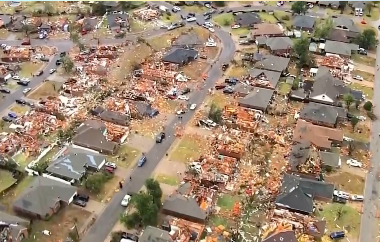 This image taken from video provided by KOCO shows damage caused by a tornado in a neighborhood near 89th and S. Sooner Road in North Moore, Okla., Sunday, Nov. 3, 2024. (KOCO via AP)