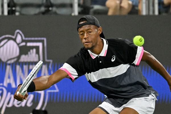 Christopher Eubanks returns the ball to Aleksandar Vukic during a quarterfinal match at the 2023 Atlanta Tennis Open at Atlantic Station, Friday, July 28, 2023, in Atlanta. (Hyosub Shin / Hyosub.Shin@ajc.com)