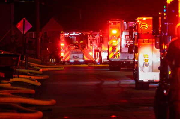 Cobb County fire crews responded to the house fire that killed three family members July 26. 