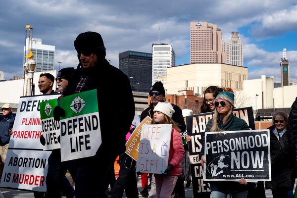 Georgia Right To Life holds a silent march in the streets of downtown Atlanta to commemorate the anniversary of the 1973 Supreme Court ruling in Roe v Wade. Friday, Janurary 24, 2025 (Ben Hendren for the Atlanta Journal-Constitution)