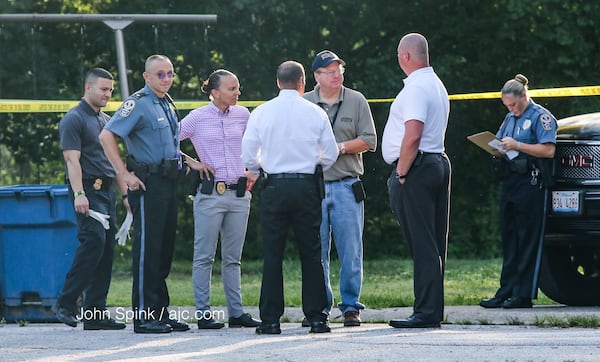 A woman was detained after Gwinnett police found a man and several children dead in a home in Loganville, police said. JOHN SPINK / JSPINK@AJC.COM