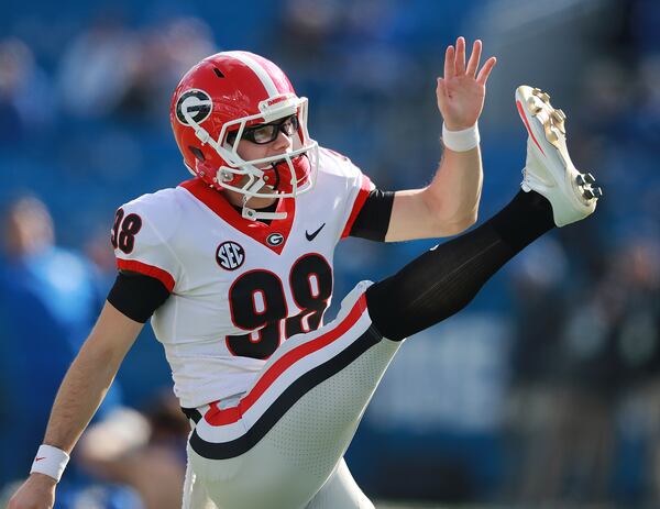 Georgia kicker Rodrigo Blankenship gets loose before playing Kentucky.  Curtis Compton/ccompton@ajc.com