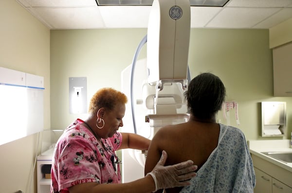 A woman receives her routine yearly mammogram at Mount Sinai Hospital in Chicago. A new federal rule requires women be informed if they have dense breast tissue. Heather Charles/Chicago Tribune/TNS