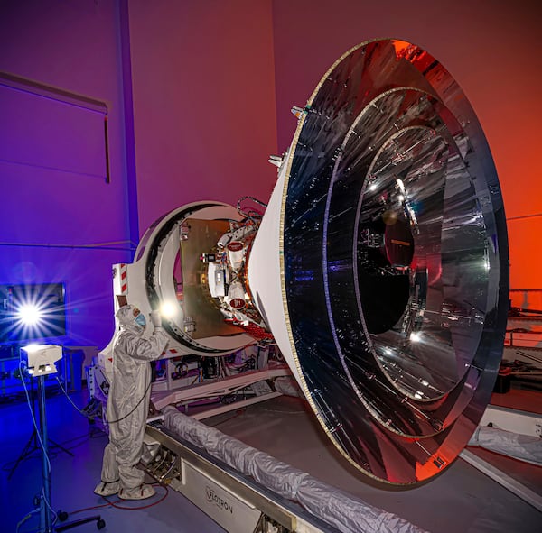 This April 2024 image provided by NASA shows the SPHEREx (Spectro-Photometer for the History of the Universe, Epoch of Reionization and Ices Explorer) telescope at BAE Systems in Boulder, Colo. (NASA via AP)