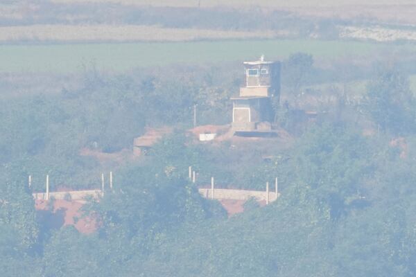 A North Korean soldier stands near the military guard post, seen from the unification observatory in Paju, South Korea, Thursday, Oct. 31, 2024. (AP Photo/Lee Jin-man)