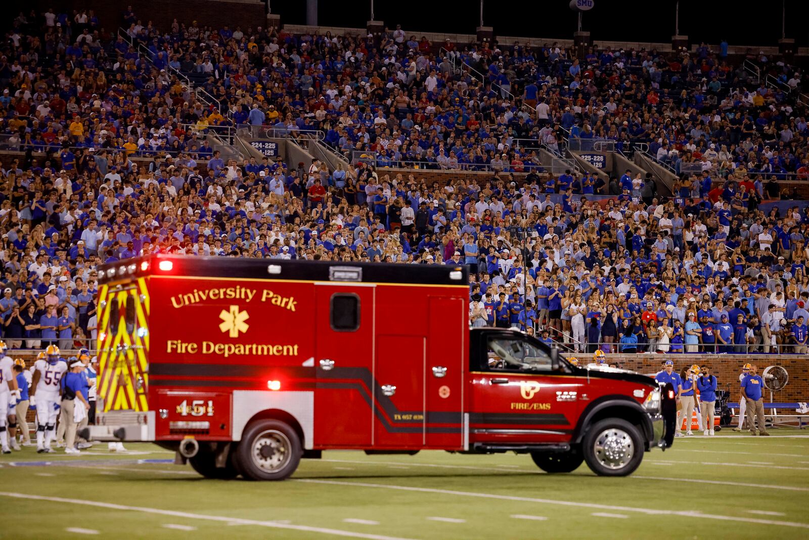 SMU cornerback AJ Davis is taken off the field by ambulance after sustaining an injury during the first half of an NCAA college football game against Pittsburgh in Dallas, Saturday, Nov. 2, 2024. (AP Photo/Gareth Patterson)