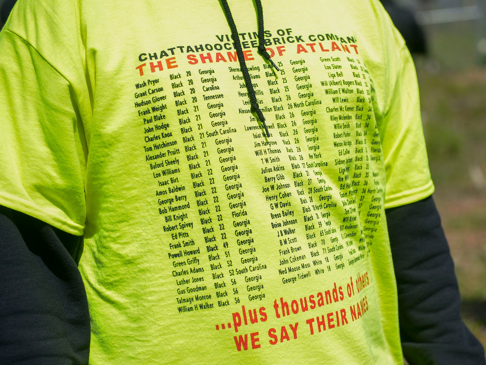 Names of victims who died while serving in the convict lease program at the Chattahoochee Brick Company are listed on a participant's shirt. The event included a procession, prayers, libations, community testimonials and site consecration Saturday, April 3, 2021, in Atlanta. (Photo: Daniel Varnado for The Atlanta Journal-Constitution)