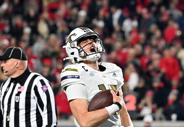 Georgia Tech quarterback Haynes King after scoring a touchdown in last season's game against UGA.