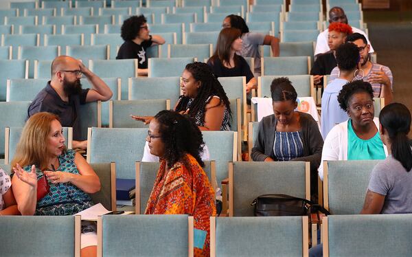 June 30, 2019 Marietta: Participants break up into groups of two for a one-on-one discussing during a Stronger Together meeting at Unity North Atlanta on Sunday, June 30, 2019, in Marietta. Curtis Compton/ccompton@ajc.com