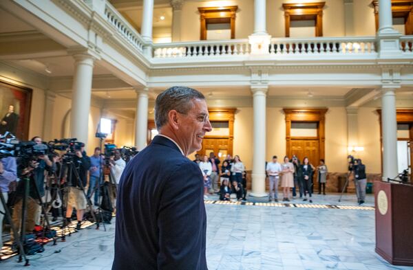 Secretary of State Brad Raffensperger joins the crowd to preview election day and takes questions from the Georgia Capitol's South Steps on Monday, Nov 4, 2024.  (Jenni Girtman for The Atlanta Journal-Constitution)