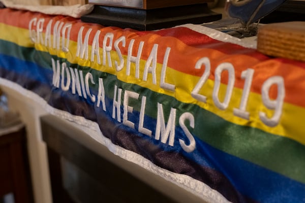 A pride banner on the mantle at Monica Helms’ home in Cobb County on Sunday, Dec. 10, 2023.   (Ben Gray / Ben@BenGray.com)