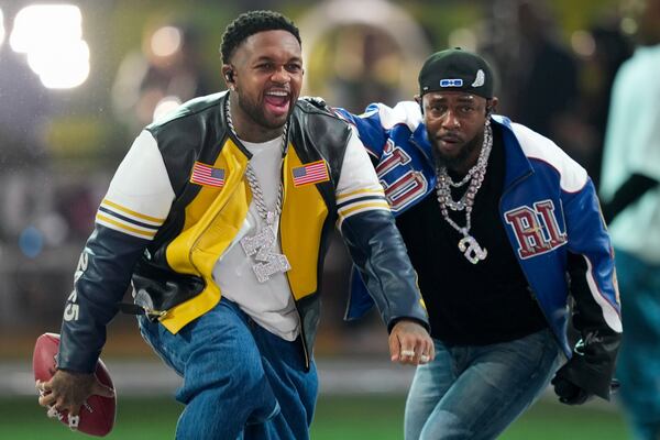 Mustard and Kendrick Lamar perform during halftime of the NFL Super Bowl 59 football game between the Kansas City Chiefs and the Philadelphia Eagles, Sunday, Feb. 9, 2025, in New Orleans. (AP Photo/Matt Slocum)