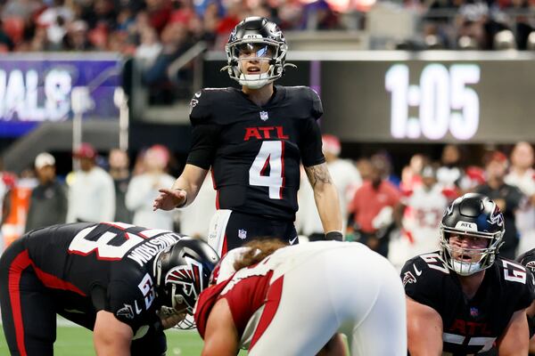  Falcons quarterback Desmond Ridder (4) calls for a play during the fourth quarter against the Cardinals on Sunday, January 1, 2023, in Atlanta. 
 Miguel Martinez / miguel.martinezjimenez@ajc.com