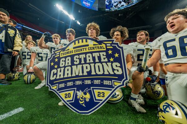 Thomas County Central celebrates after winning the Class 6A state title over Woodward Academy Tuesday.