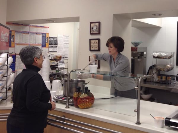 Former AJC publisher Amy Glennon, right,  was beloved by the staff for lots of reasons, never more so when she served soup when it looked like we would be having a staff sleepover. Was I smart enough to stay put? No. I was not.