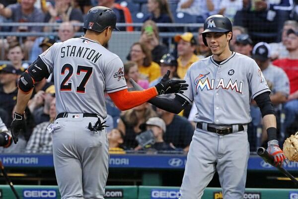  Giancarlo Stanton already has been dealt away by the Marlins, and Christian Yelich (right) is available, too. But the price is steep for any interested team. (AP photo)