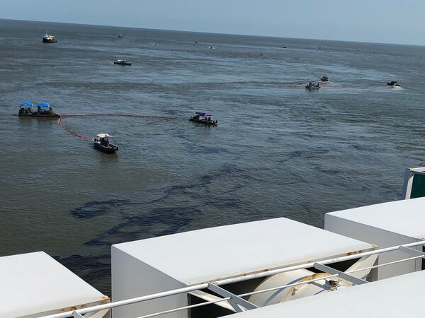 Response teams used skimmers to clean up a fuel discharge from the capsized ship on Sept. 30. Crews have continued to empty vehicle fuel tanks while also trying to limit potential impacts to the shoreline. CONTRIBUTED BY ST. SIMONS SOUND INCIDENT UNIFIED COMMAND