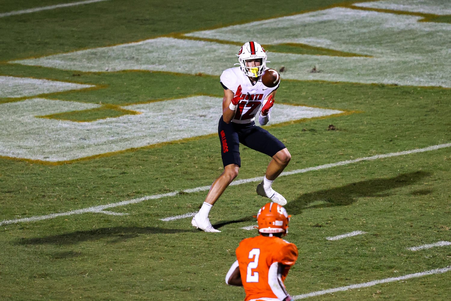 North Gwinnett wide receiver Marek Briley (12) pulls in a pass before running into the end zone for a touchdown during a GHSA 7A high school football game between the North Gwinnett Bulldogs and the Parkview Panthers at Parkview High School in Lilburn, Ga., on Friday, Sept. 3, 2021. (Casey Sykes for The Atlanta Journal-Constitution)