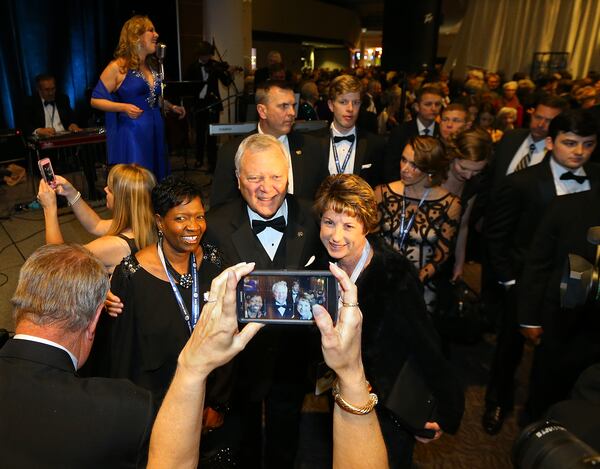 011515 DULUTH: Sylvia Carter (left) and Mary Gene Pernice, both from Atlanta, have thier picture taken with Governor Nathan Deal as he arrives for the 2015 Inaugural Gala with The Mighty Deal Band playing in the lobby at the Arena at Gwinnett Center on Thursday, Jan. 15, 2015, in Duluth. View more photos and a video online at our premium website, myAJC.com. Curtis Compton / ccompton@ajc.com Gov. Nathan Deal, shown here at his recent 2015 Inaugural Gala, has chosen his Education Reform Commission members. (. Curtis Compton / ccompton@ajc.com)