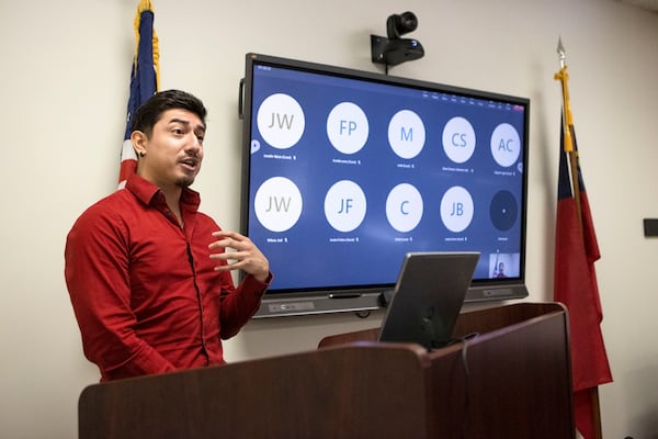 Jonathan Peraza Campos speaks during the Georgia Professional Standards Commission meeting to consider changes to its educator preparation rules on Thursday, June 8, 2023. (Christina Matacotta for The Atlanta Journal-Constitution)