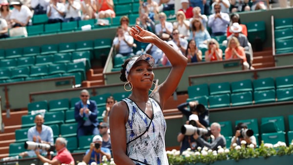 Venus Williams of the U.S. celebrates winning 6-3, 6-1, against Japan's Kurumi Nara.