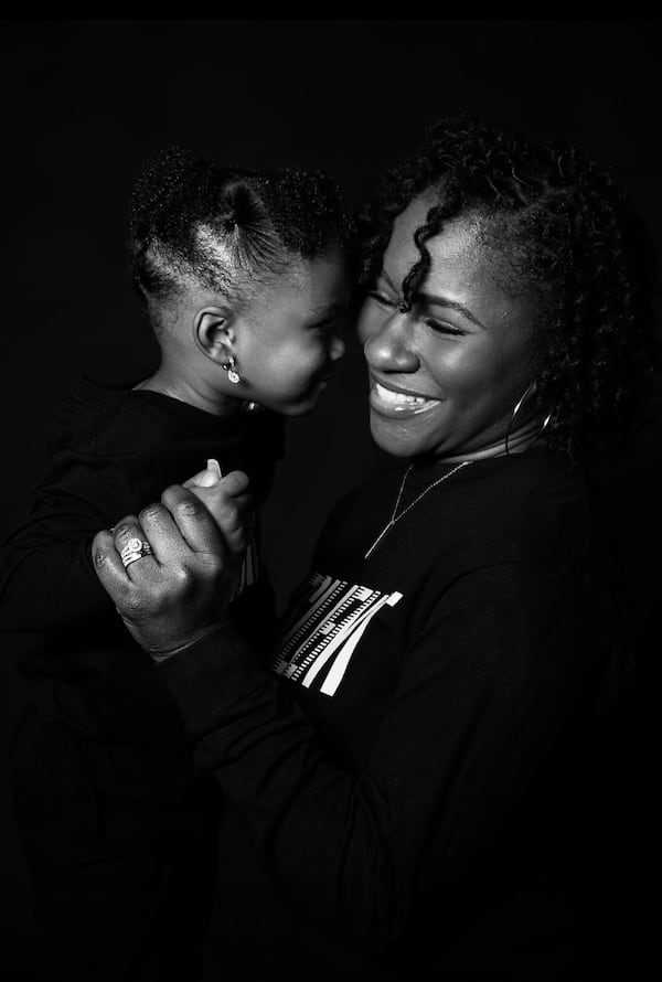 Sanari Hendricks, 31, of Douglasville with daughter Zion, 3. (Courtesy of Mike Newman / Shane Michael Photography)