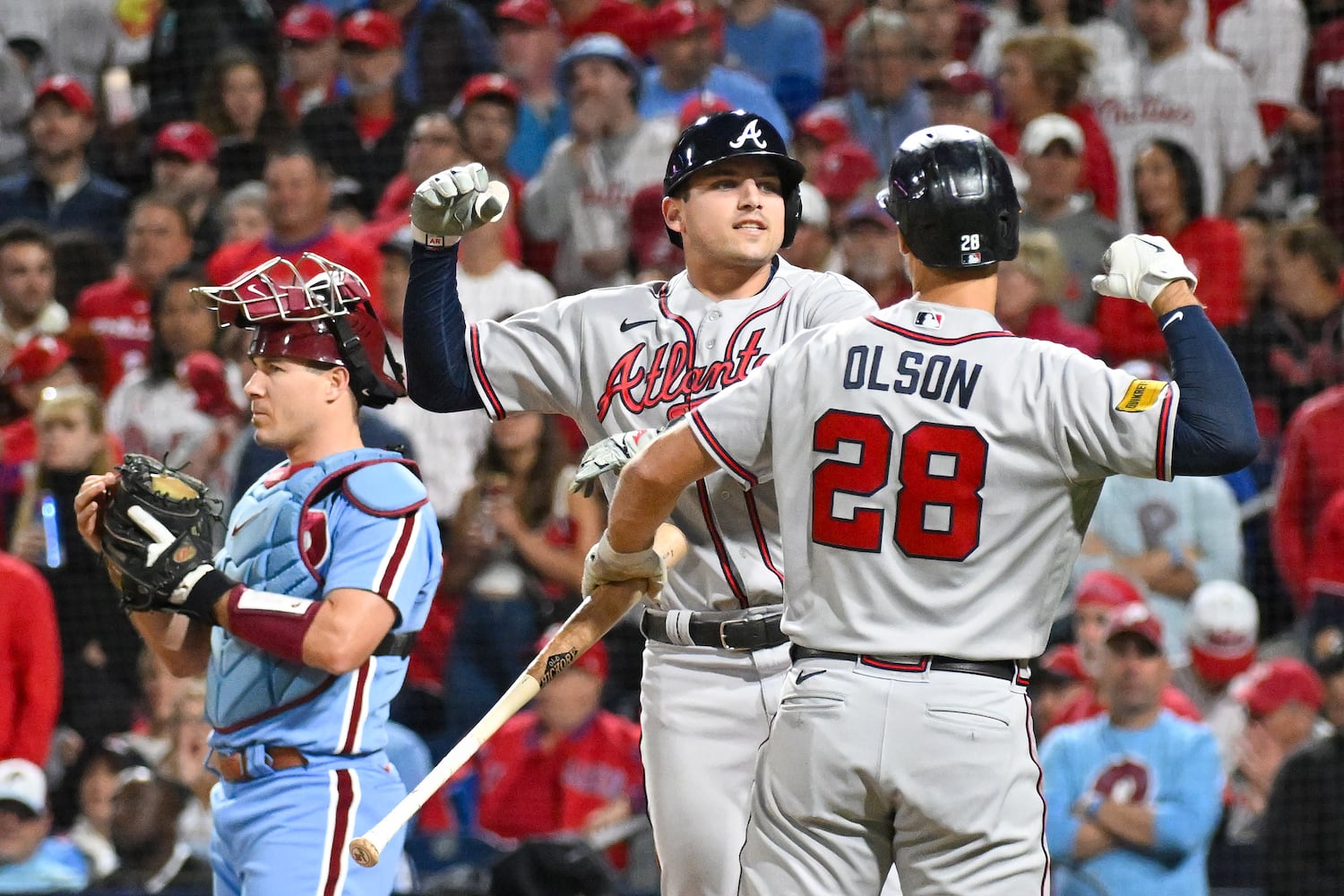 Atlanta Braves’ Austin Riley celebrates with Matt Olson (28) after a solo home run against the Philadelphia Phillies during the fourth inning of NLDS Game 4 at Citizens Bank Park in Philadelphia on Thursday, Oct. 12, 2023.   (Hyosub Shin / Hyosub.Shin@ajc.com)