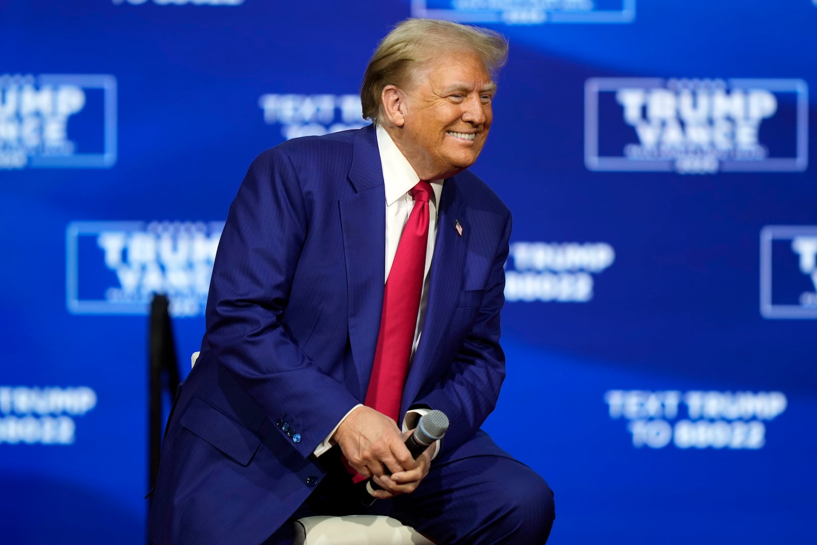 Republican presidential nominee former President Donald Trump listens at a campaign town hall at the Greater Philadelphia Expo Center & Fairgrounds, Monday, Oct. 14, 2024, in Oaks, Pa. (AP Photo/Matt Rourke)