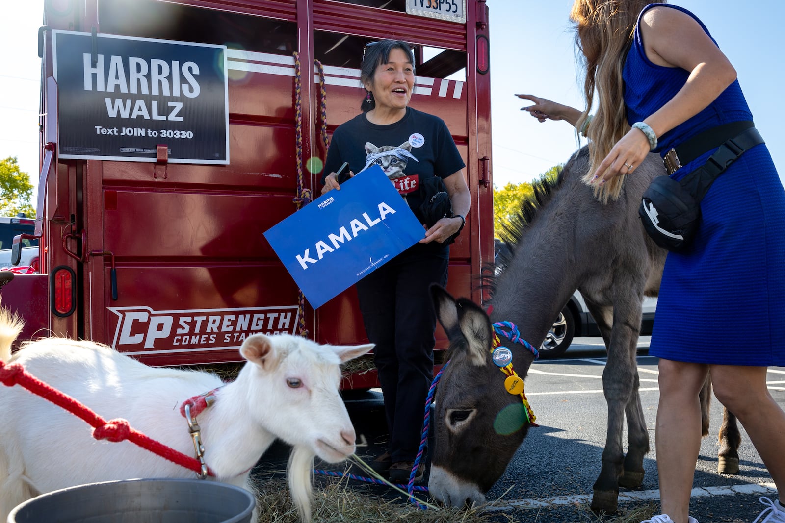 Cam Ashling has been a political activist for years, bringing her donkey Hercules from her farm to several Democratic campaign events. Hercules is a fan favorite, seen here with Donna Wong at a "Dim Sum for Kamala" rally in Johns Creek in September. "So many people say, 'I've never been to a campaign rally with a donkey,'" Ashling said. Ashling said many in AAPI communities feel neglected. "We have to constantly remind the campaigns, because it’s a new campaign (staff) every round, how important the AAPI vote is to marginal victories." 