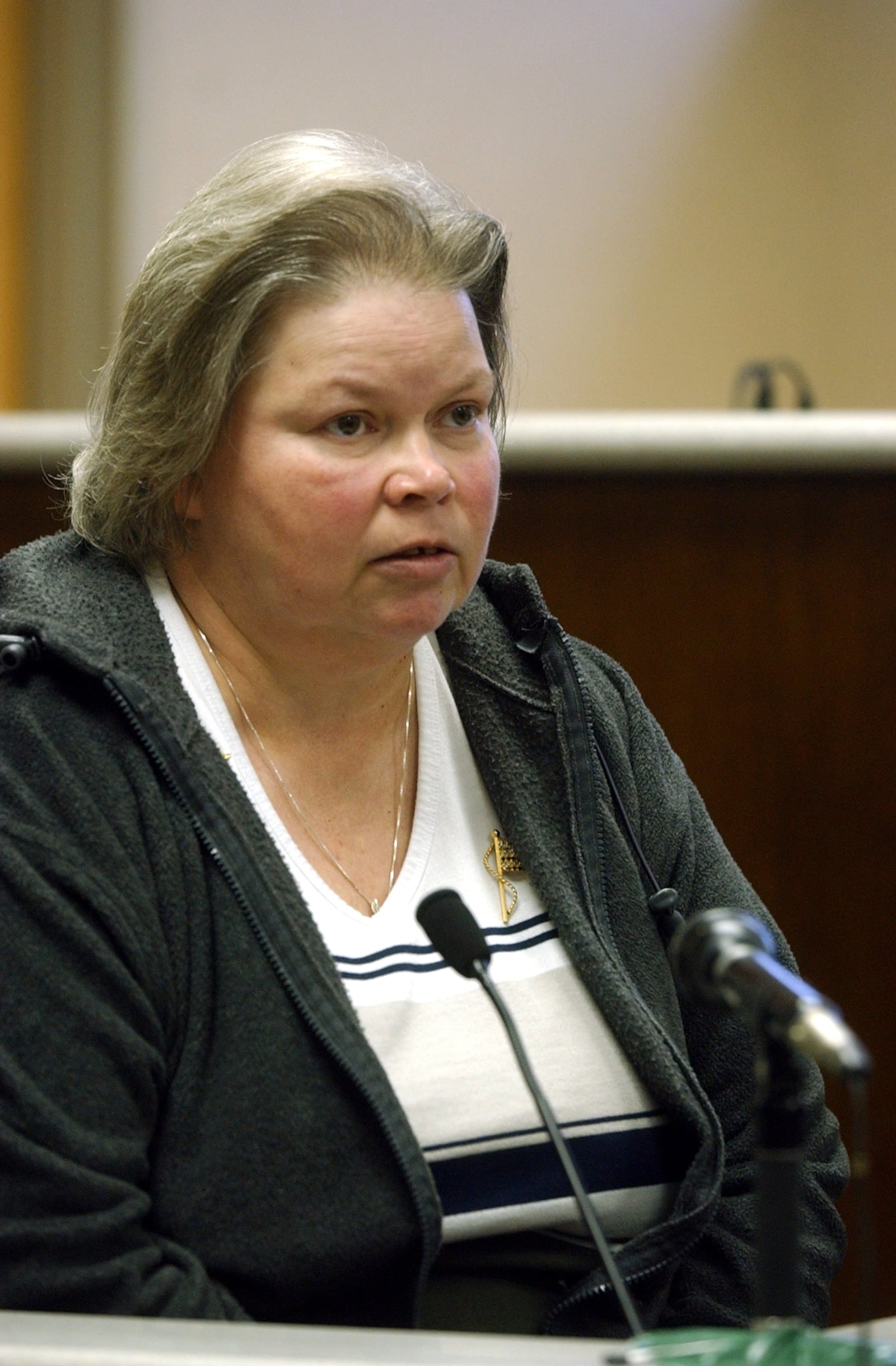 Norma Patton testifies in court against her husband, Carl Patton, who was accused of killing four people. In exchange for her testimony, she was given immunity from accessory to murder charges but did plead guilty in connection with the killings of Liddie Evans and Joe Cleveland, a DeKalb case, receiving 12 months' probation and a $1,000 fine. (MARLENE KARAS/AJC staff)