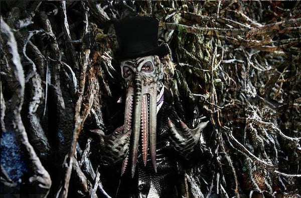 Half-man, half-octopus-face, and waiting to scare you at Netherworld.