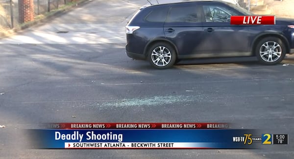 Broken glass could be seen at the Lyke House Catholic Center on Tuesday afternoon.