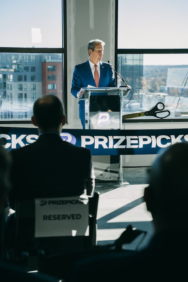 Gov. Brian Kemp speaks at the PrizePicks office ribbon-cutting ceremony in Atlanta on Thursday, Dec. 12, 2024 (Olivia Bowdoin for the AJC).