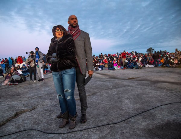 Montell Jordan (R) and his wife Kristin enjoy the view on the top of Stone Mountain before the start of the 75th Annual Easter Sunrise Service Sunday, April 21, 2019. Jordan, a former Billboard Top Ten artist, now serves as executive pastor for Victory World Church in Norcross, GA. STEVE SCHAEFER / SPECIAL TO THE AJC