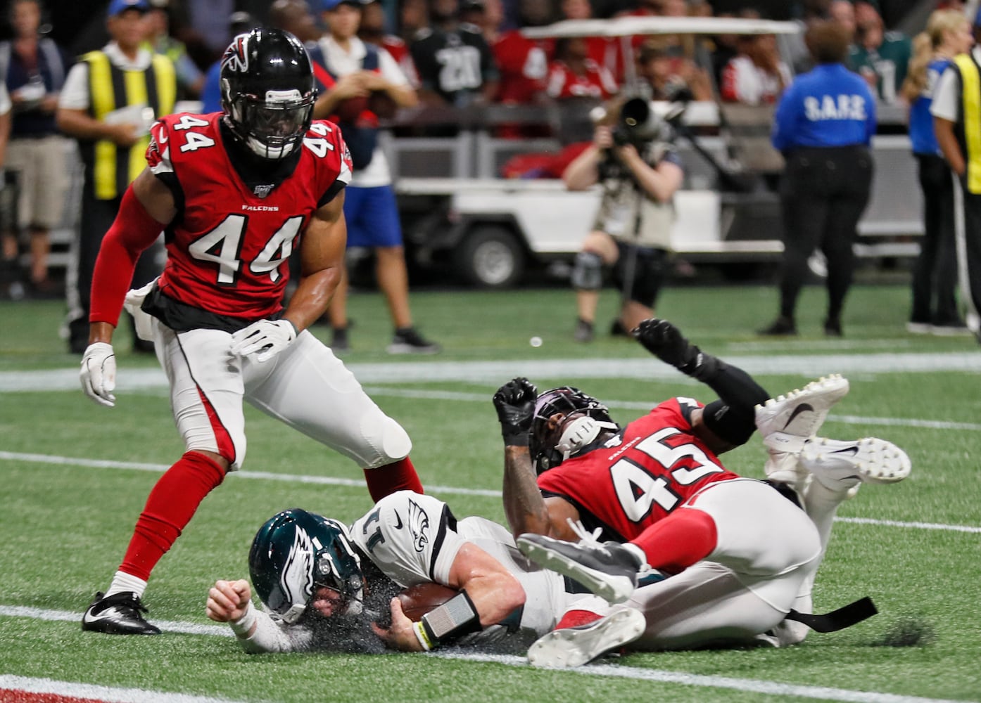 Photos: Falcons outlast Eagles for first win