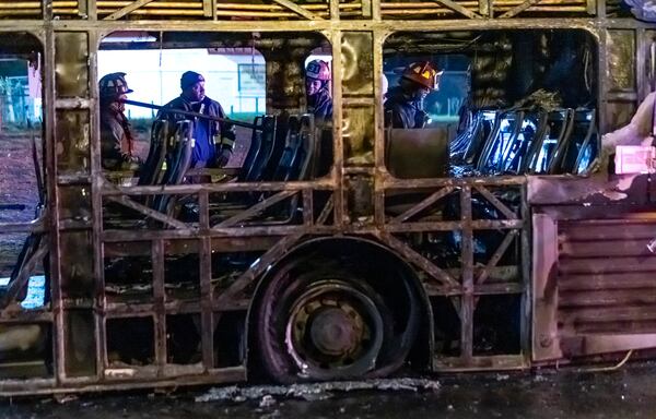 Atlanta firefighters battled a huge fire that destroted a MARTA bus early Monday morning. (John Spink / John.Spink@ajc.com)

