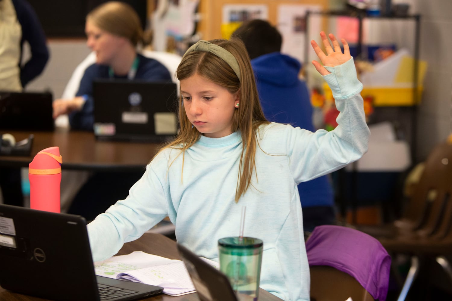 Penny Davis raises her hand during class on Wednesday, November 16, 2022, at Hickory Hills Elementary School in Marietta, Georgia. Marietta City Schools, like schools across the country, are working to overcome learning loss caused by the pandemic. CHRISTINA MATACOTTA FOR THE ATLANTA JOURNAL-CONSTITUTION