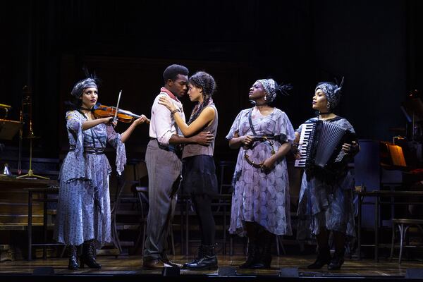 Chibueze Ihuoma and Hannah Whitley play lovers Orpheus and Eurydice in the national tour of Broadway’s “Hadestown.” The role of Eurydice was played by Courtney Lauster at Tuesday's performance. The show is at the Fox Theatre through Sunday. 
(Courtesy of T. Charles Erickson)