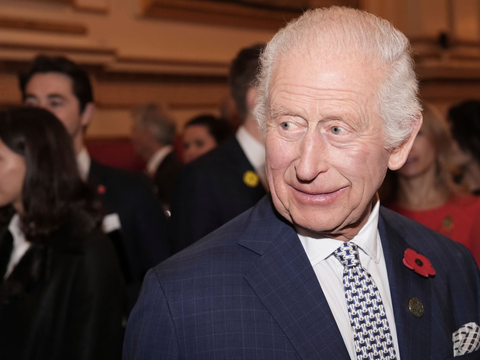 Britain's King Charles III meets guests during an International Sustainability reception at Buckingham Palace in London, Wednesday Nov. 6, 2024. (Jordan Pettitt/Pool via AP)