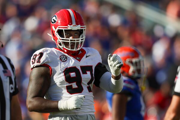 Georgia defensive lineman Warren Brinson (97) reacts after a defensive play during their game against Florida at EverBank Stadium, Saturday, October 27, 2023, in Jacksonville, Fl. Georgia won 43-20 against Florida. (Jason Getz / Jason.Getz@ajc.com)