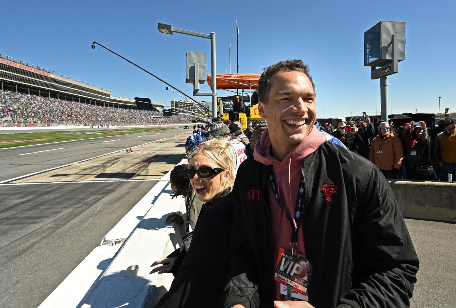 Atlanta Falcons quarterback Desmond Ridder reacts as he watches the start of Ambetter Health 400 NASCAR Cup Series Race at Atlanta Motor Speedway, Sunday, March 19, 2023, in Hampton. (Hyosub Shin / Hyosub.Shin@ajc.com)